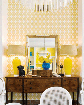I love this entryway! Greeting your guests with a bold wallpaper and bright yellow accents is a great way to introduce them to your style and personality. Using wallpaper in an entryway also allows you to make a big statement in a small space.