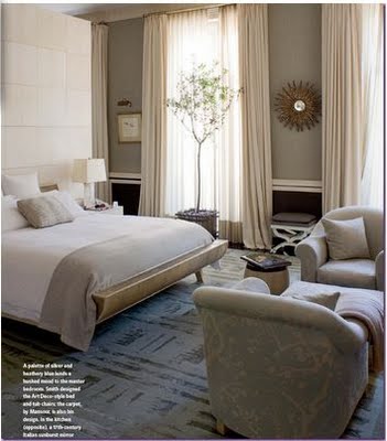 love the rug used in this master bedroom suite. The touch of silver 